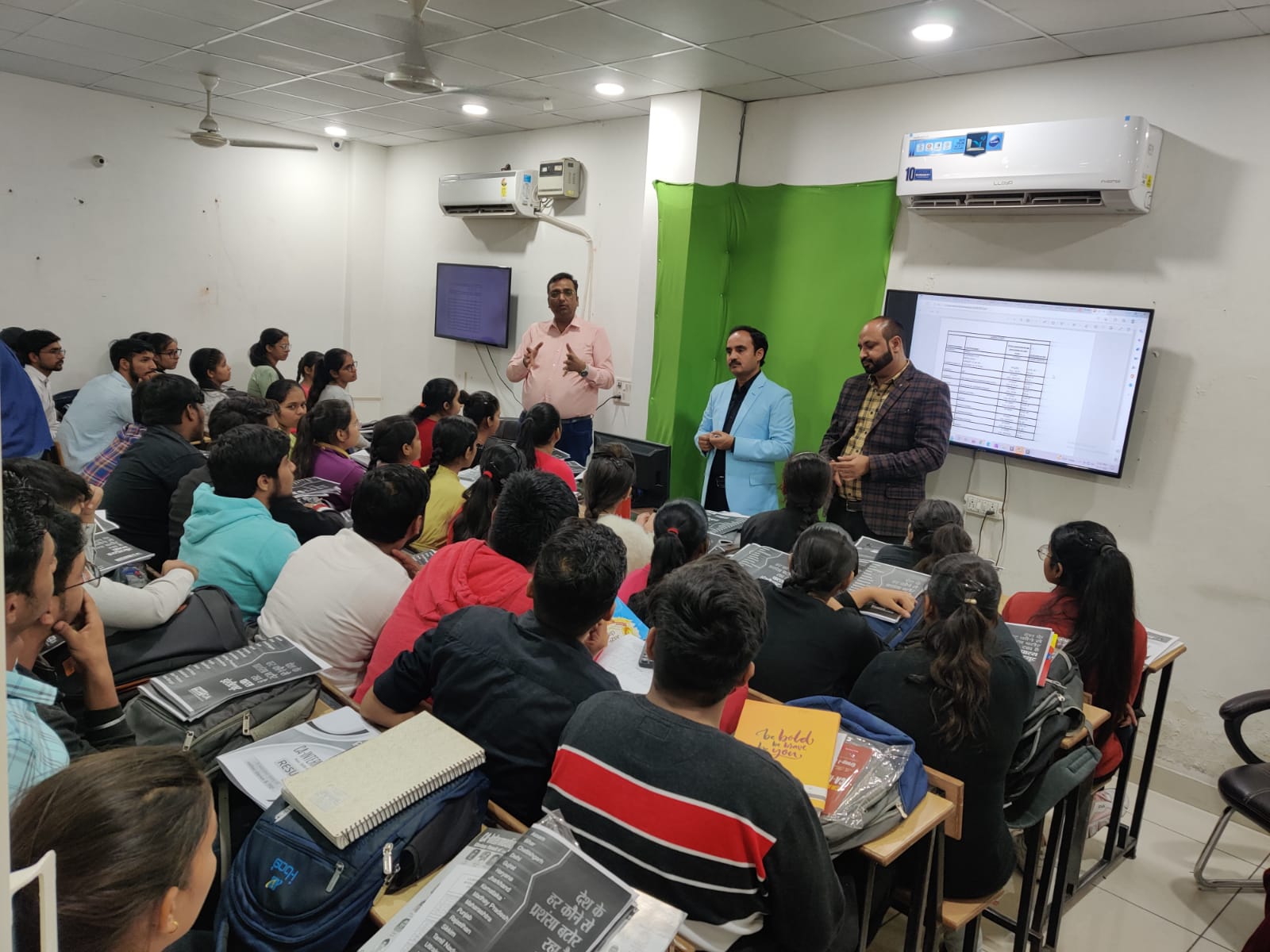 Directors of Paras Institute of Commerce guiding students at ICP Shiskha Panipat