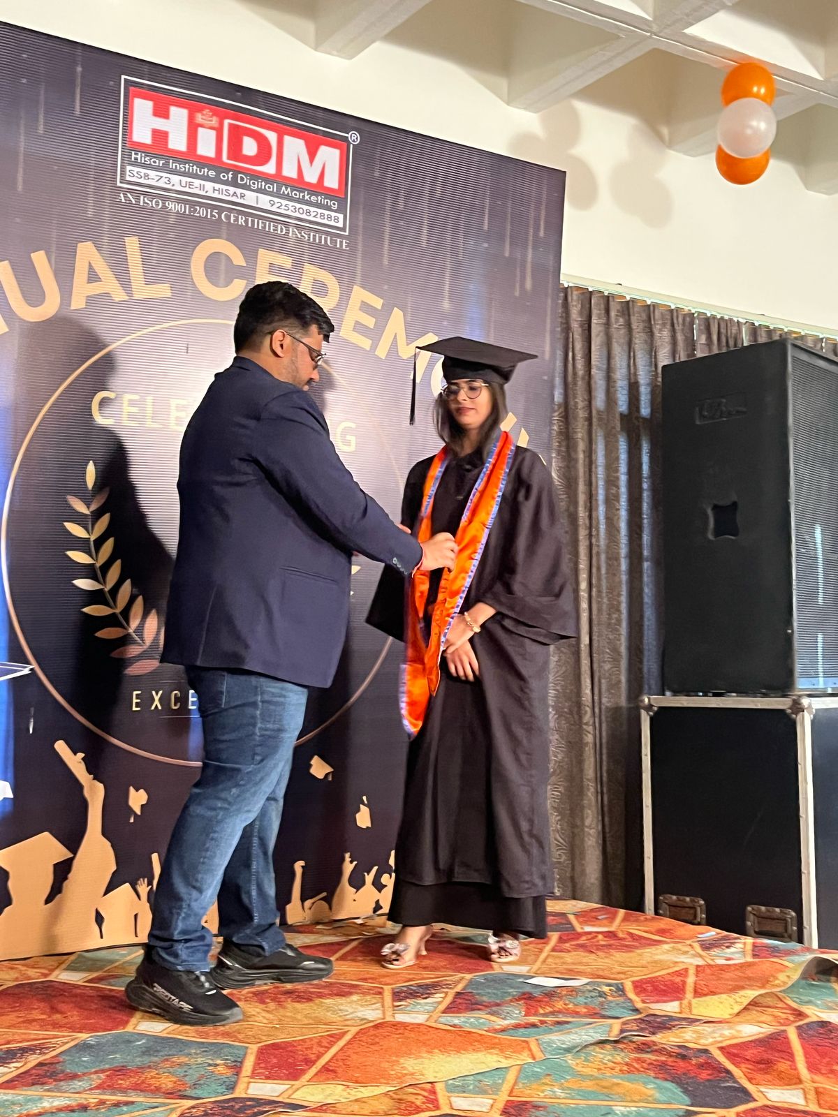 Proud moment as student receives course completion certificate.