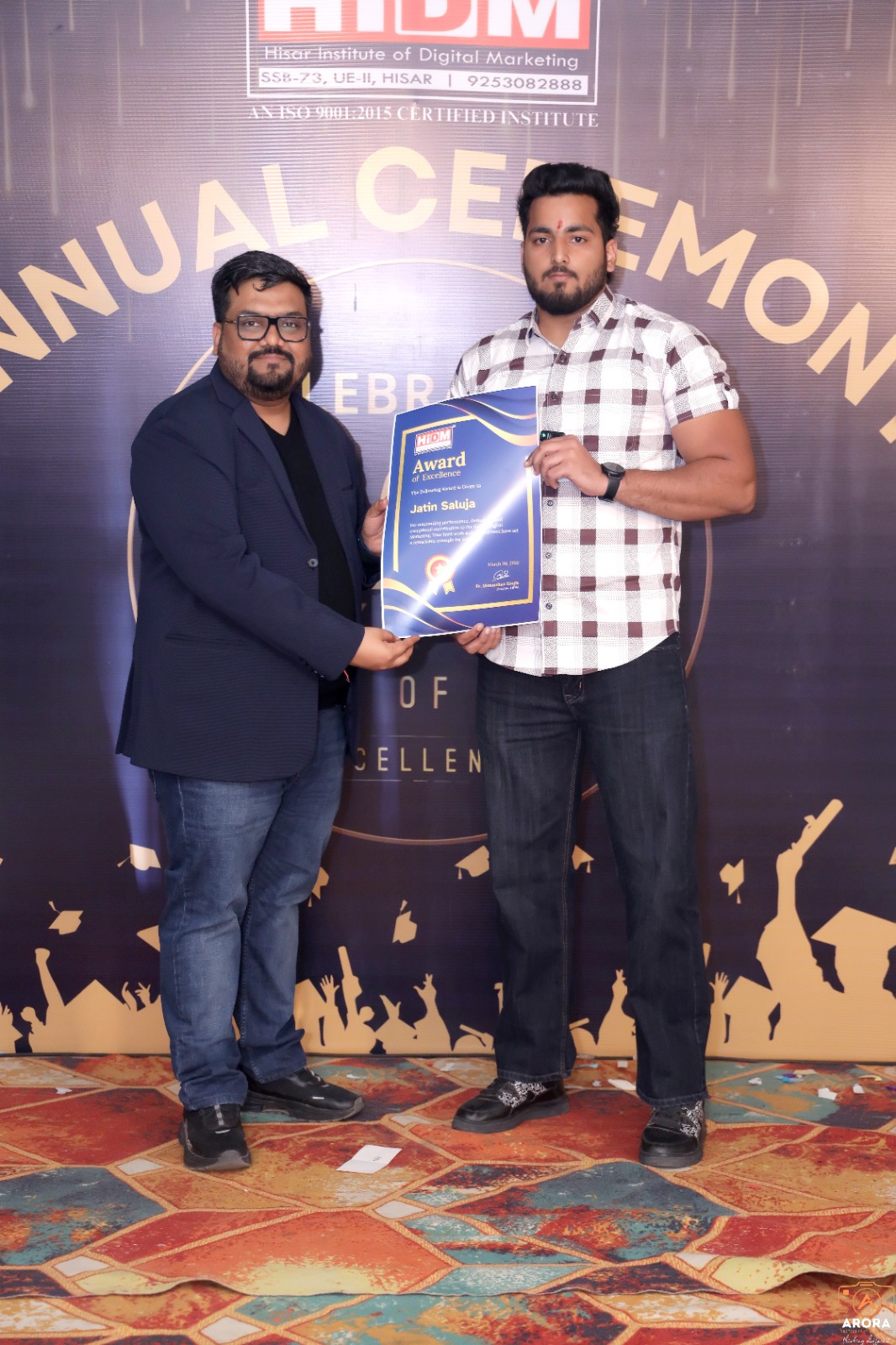 HIDM student holding Digital Marketing Excellence Certificate with pride.