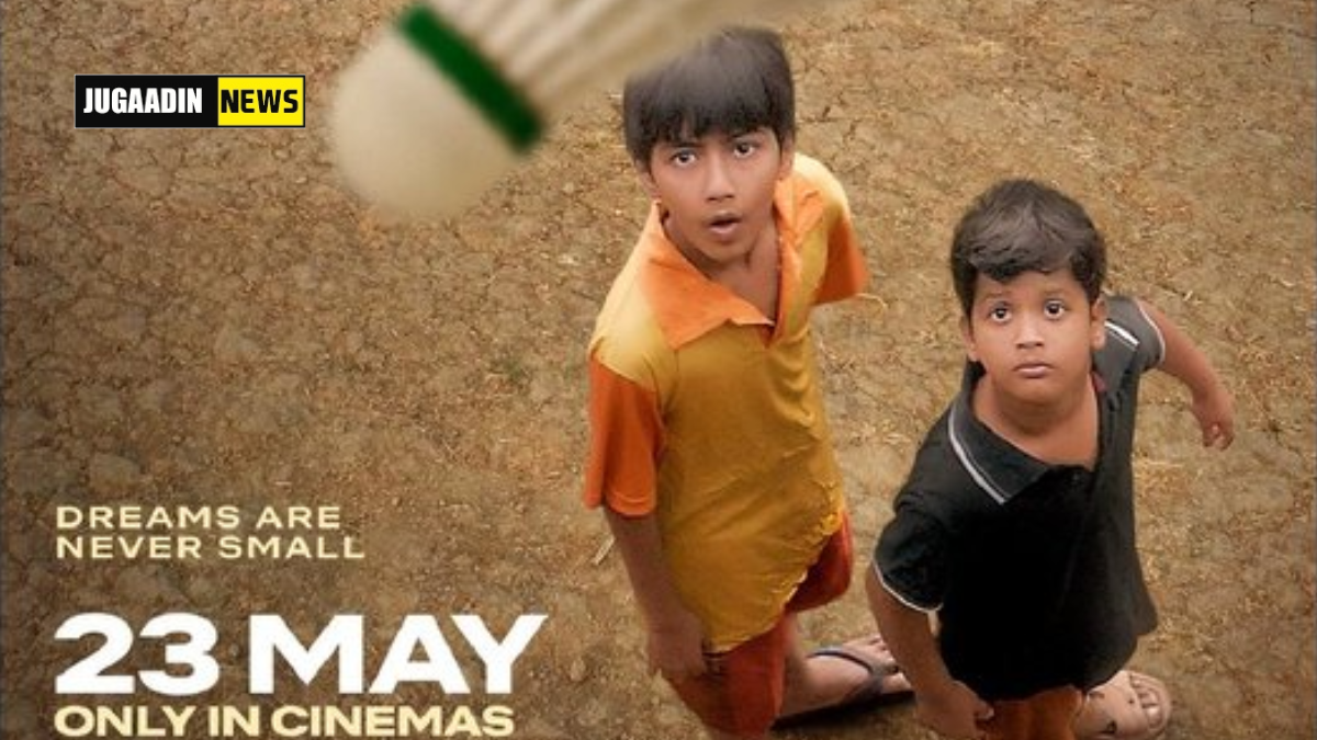 A scene from the film Chidiya showing two boys gazing at a shutter, symbolizing their quiet struggle and dreams.