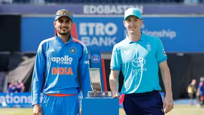 India and England ODI captains stand beside the series trophy before the opening One Day International match, posing for an official pre-match photograph at the stadium.
